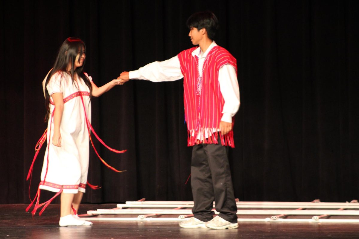 Juniors Soe Lowin and Wah Wah modeling Karen clothing. 