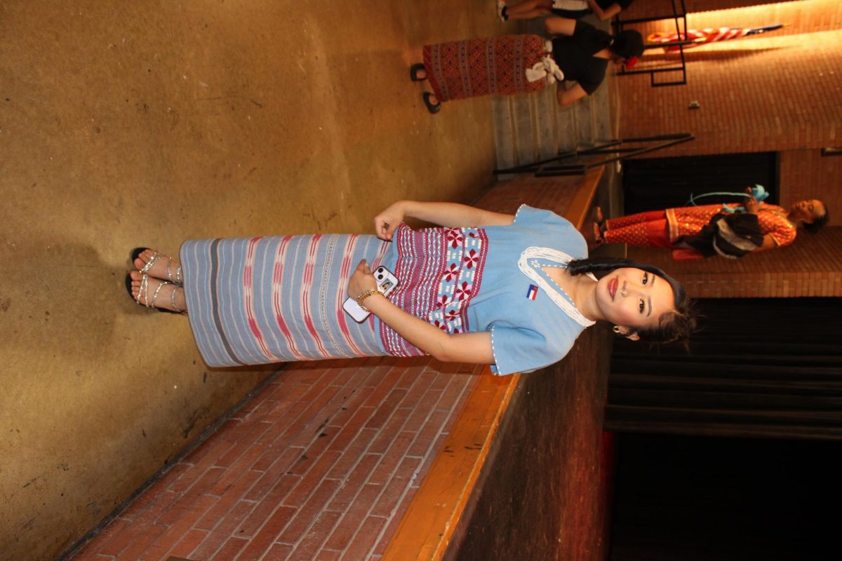 Junior Nicole Esteban wearing a Kareni Dress.