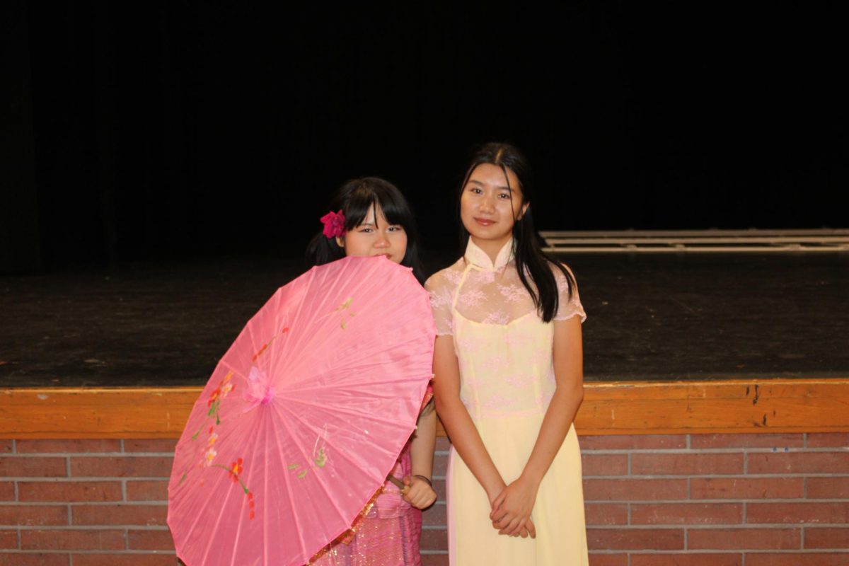 Sophomore Rose Baby and Junior Sarah Ho posing for a picture.